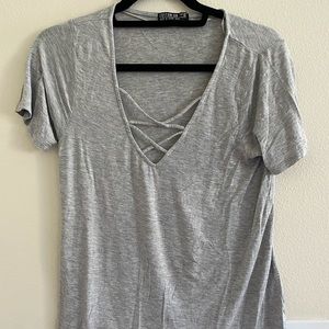 Criss cross grey shirt